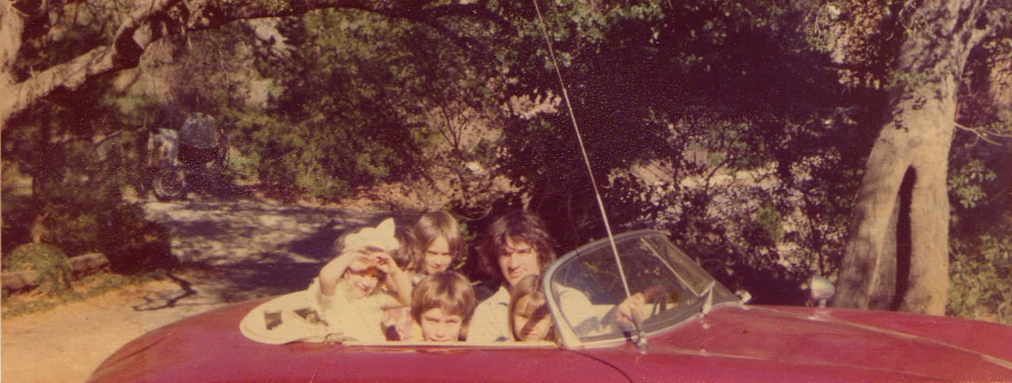1976. A trip to California to rehearse for The Last Waltz concert. Rick Danko giving his kids and ours a ride in his Porsche.